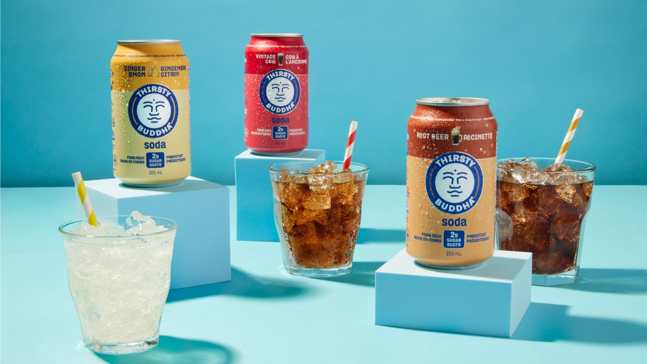 Cans of Thirsty Buddha Soda 