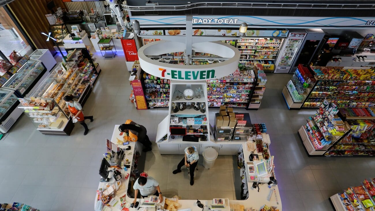 Pattaya, Thailand - May 25, 2023: Aerial view of a 24h 7-Eleven convenience store located in the coastal city of Pattaya, near Bangkok. This shop is considered the World's largest 7-11.; Shutterstock ID 2308430039