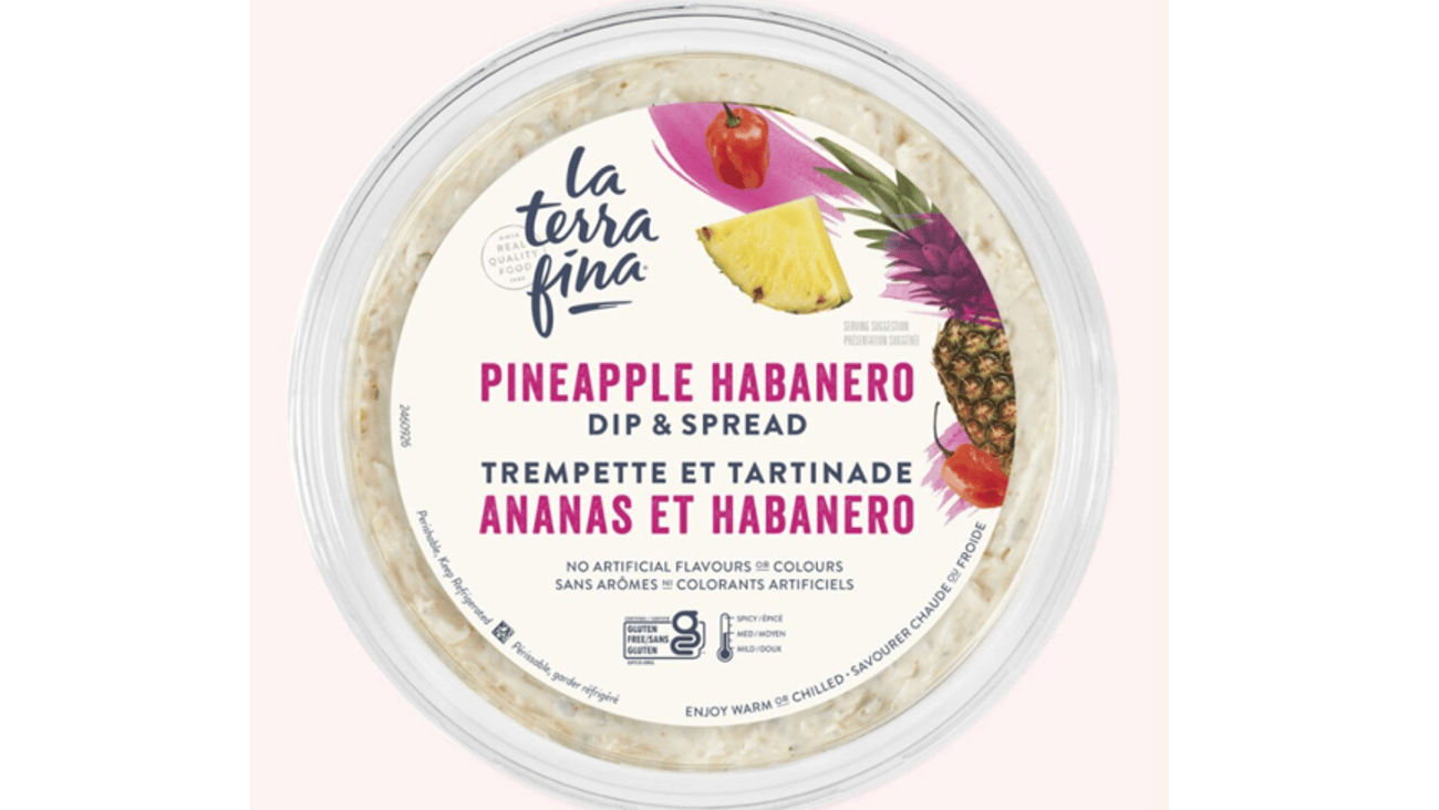 A tub of La Terra Fina Pineapple Habanero Dip and Spread against a pale pink background