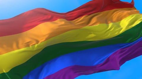 Rainbow 3D flag, LGBT pride 3D flag or gay pride 3D flag waving at wind,. 3D flag symbol of freedom, peace, and equality. Lesbian, gay, bisexual, transgender, and queer (LGBTQ).