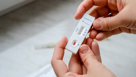 A patient with Covid-19 did an express test at home, the result is positive. Covid-19 test kit for detecting IgM IgG antibodies and immunity in 15 minutes.