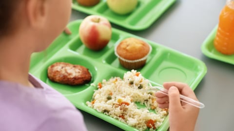 TEASER girl eating breakfast. Shutterstock