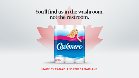 A pack of Cashmere bathroom tissue against a red maple leaf