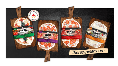 Pinsa Romana lineup of products on wood boards
