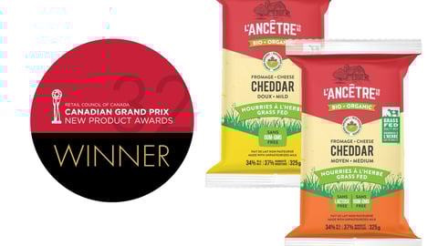 Two bags of Fromagerie L’Ancetre Organic Grass Fed Cheddar cheese next to the grand Prix winners logo