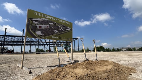 Dirt and shovels breaking ground on a mall development. Urban Reform Realty