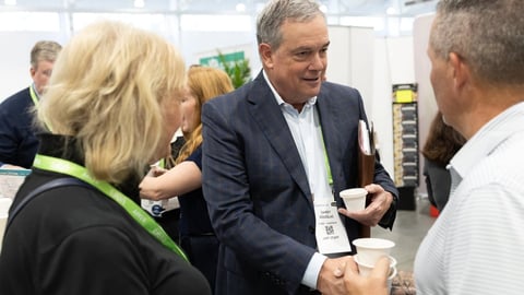 UNFI CEO Sandy Douglas on the show floor of the distributor's recent Holiday and Winter Selling Show at the Mohegan Sun resort, in Uncasville, Conn.