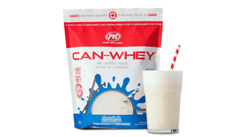 Pack of Can-Whey next to a glass of vanilla milkshake