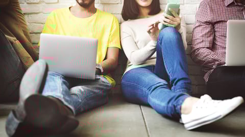 Young adults relaxing on a couch
