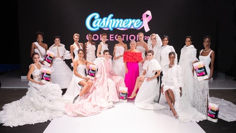 Group of models pose for Kruger's Cashmere Collection fashion show 