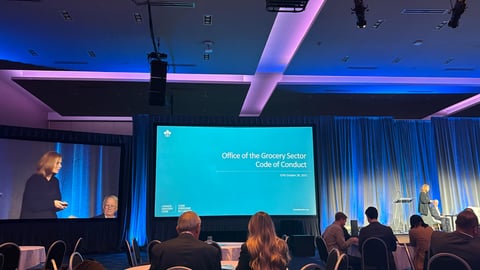 Karen Proud presenting on stage at GIC