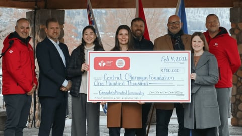 Members of the Coke Canada Bottling, Community Foundations of Canada, Central Okanagan Foundation teams and Peachland community members pose with the Canada’s Kindest Community donation cheque. 