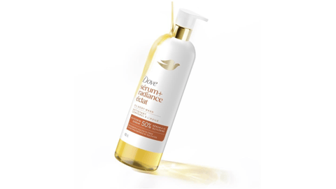 A bottle of Dove Serum+ Oil Body Wash Collection