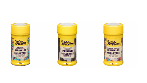 Three shakers of Wilton Sprinkles