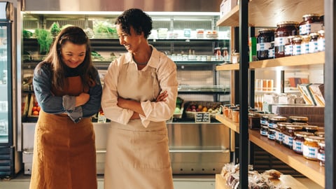 grocery store workers happy laughing