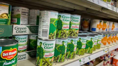 green giant and del monte brands on grocery store shelf