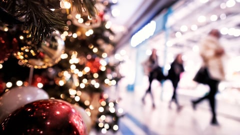 Christmas rush, Christmas lights with  silhouettes of defocused shoppers in a shopping mall; Shutterstock ID 2364614633