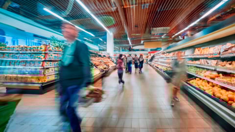 Blurry image of a supermarket aisle with shoppers moving quickly, creating a dynamic and busy atmosphere, ideal for retail or consumerism themes.; Shutterstock ID 2500928423
