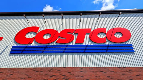 Raleigh, North Carolina - May 2 2025: Costco Wholesale Gold Star Membership Card Held In Hand in Front of Storefront Location; Shutterstock ID 2622014439