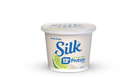 A tub of Silk Greek-style plant-based yogurt in lime