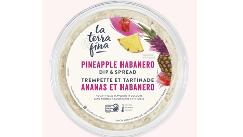 A tub of La Terra Fina Pineapple Habanero Dip and Spread against a pale pink background