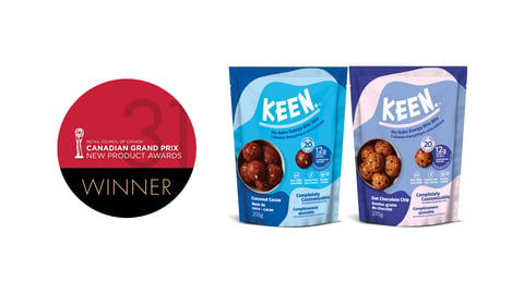 Two bags of KEEN No-Bake Energy Bite Mix next to the Grand Prix logo