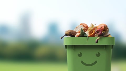 Smiling cute garbage bin character full of organic biodegradable waste, separate waste collection and recycling concept; Shutterstock ID 2135886895