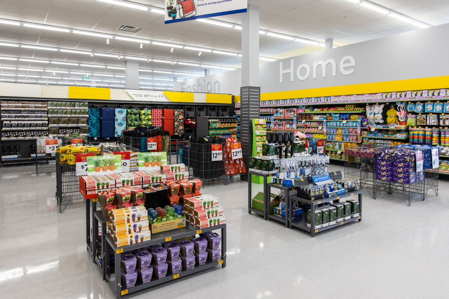 Centre store section of a Giant Tiger store; shelves and baskets of food