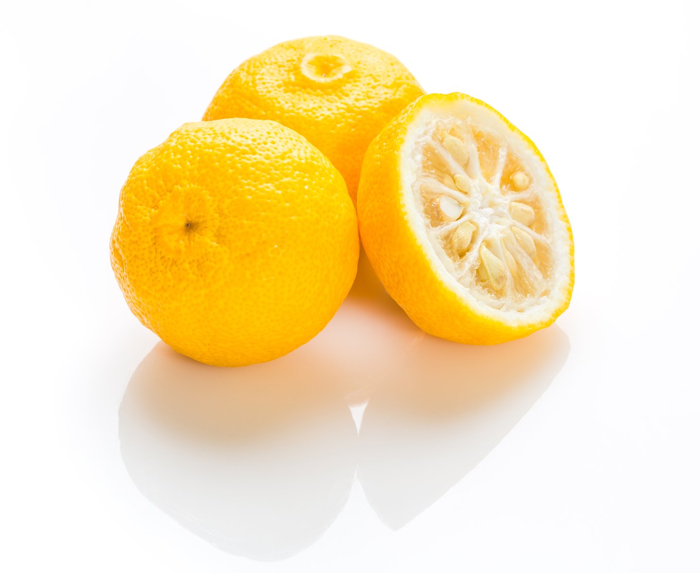 Japanese citron Yuzu citrus fruits isolated on white background