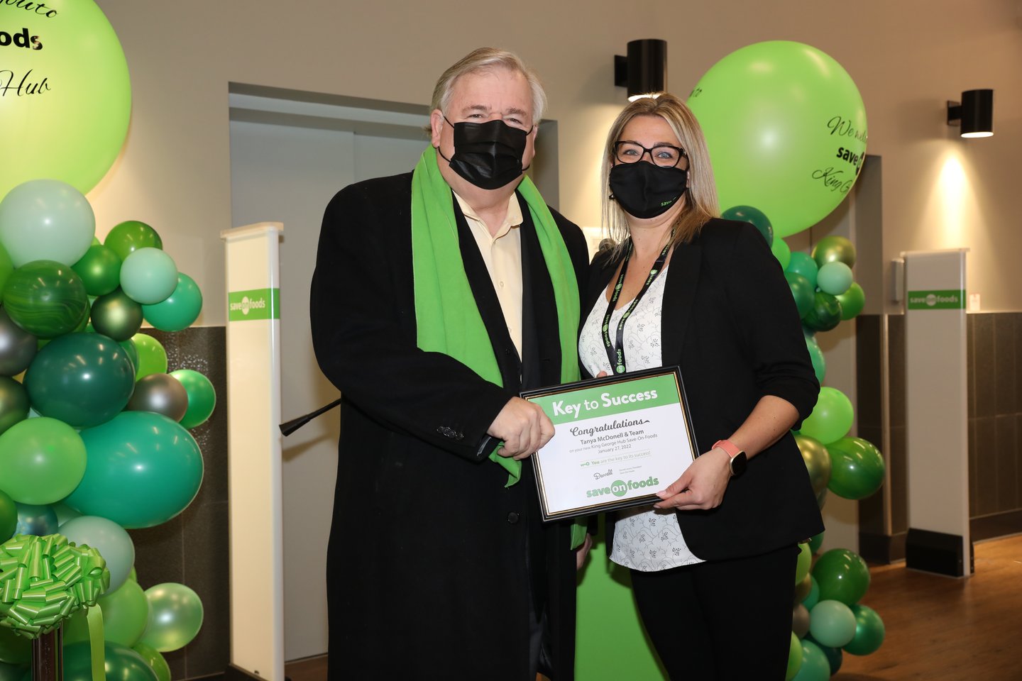 Save-On-Foods president Darrell Jones and store manager Tanya McDonnell