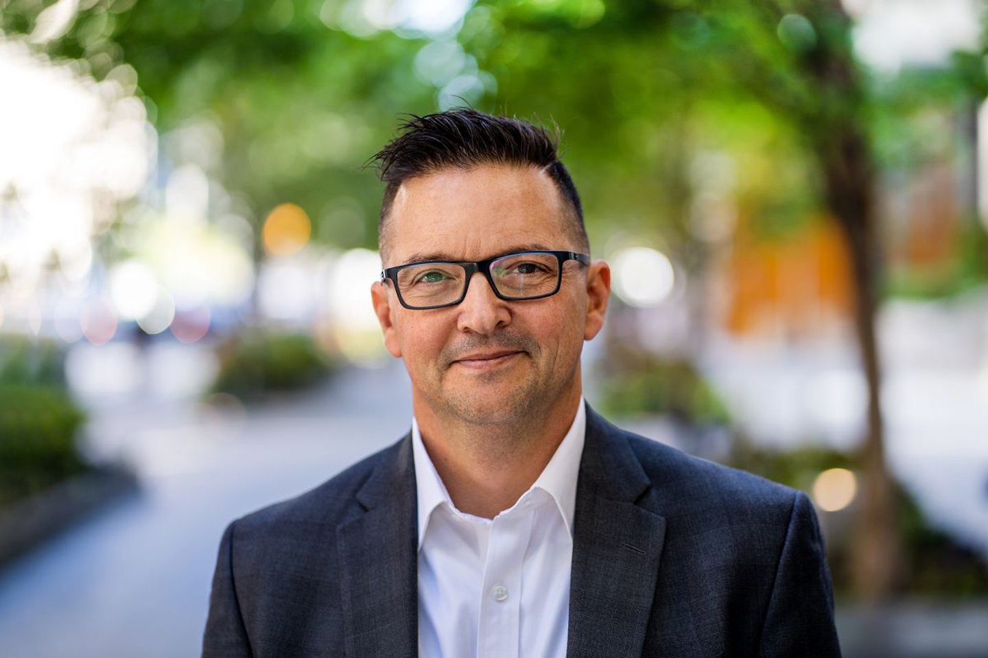 Headshot of Kevin Lacey (SVP, CPG Lead) standing outside
