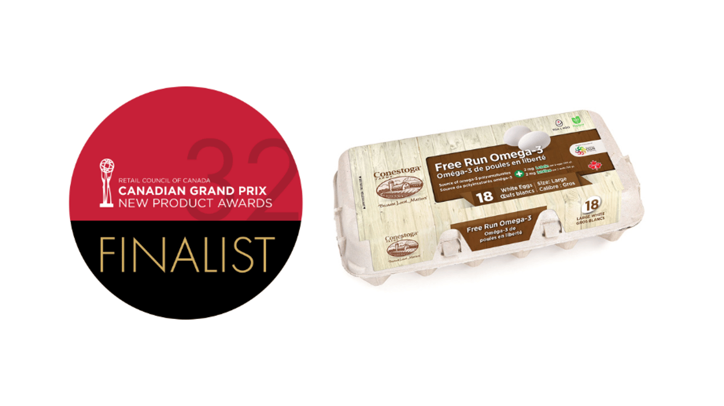 Carton of Free Run Omega-3 Lutein Eggs next to the Grand Prix Finalists logo