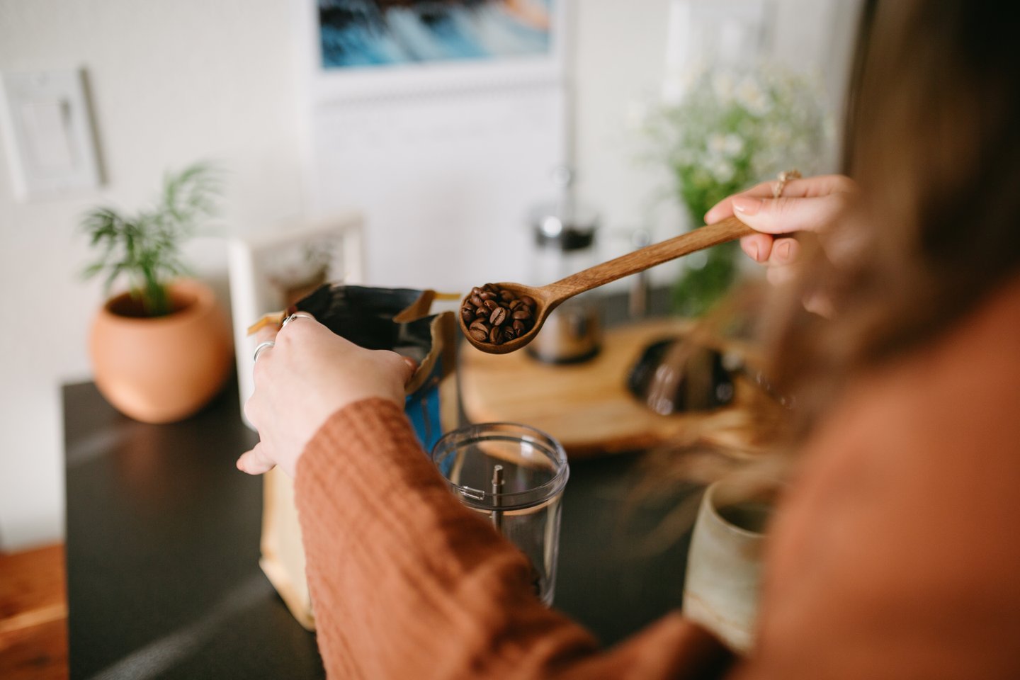 woman making coffee at home