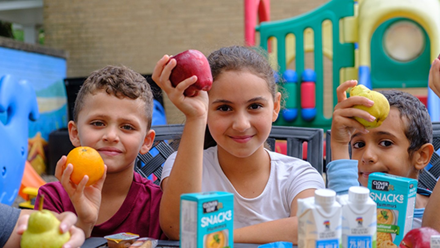 Children with fruit snacks