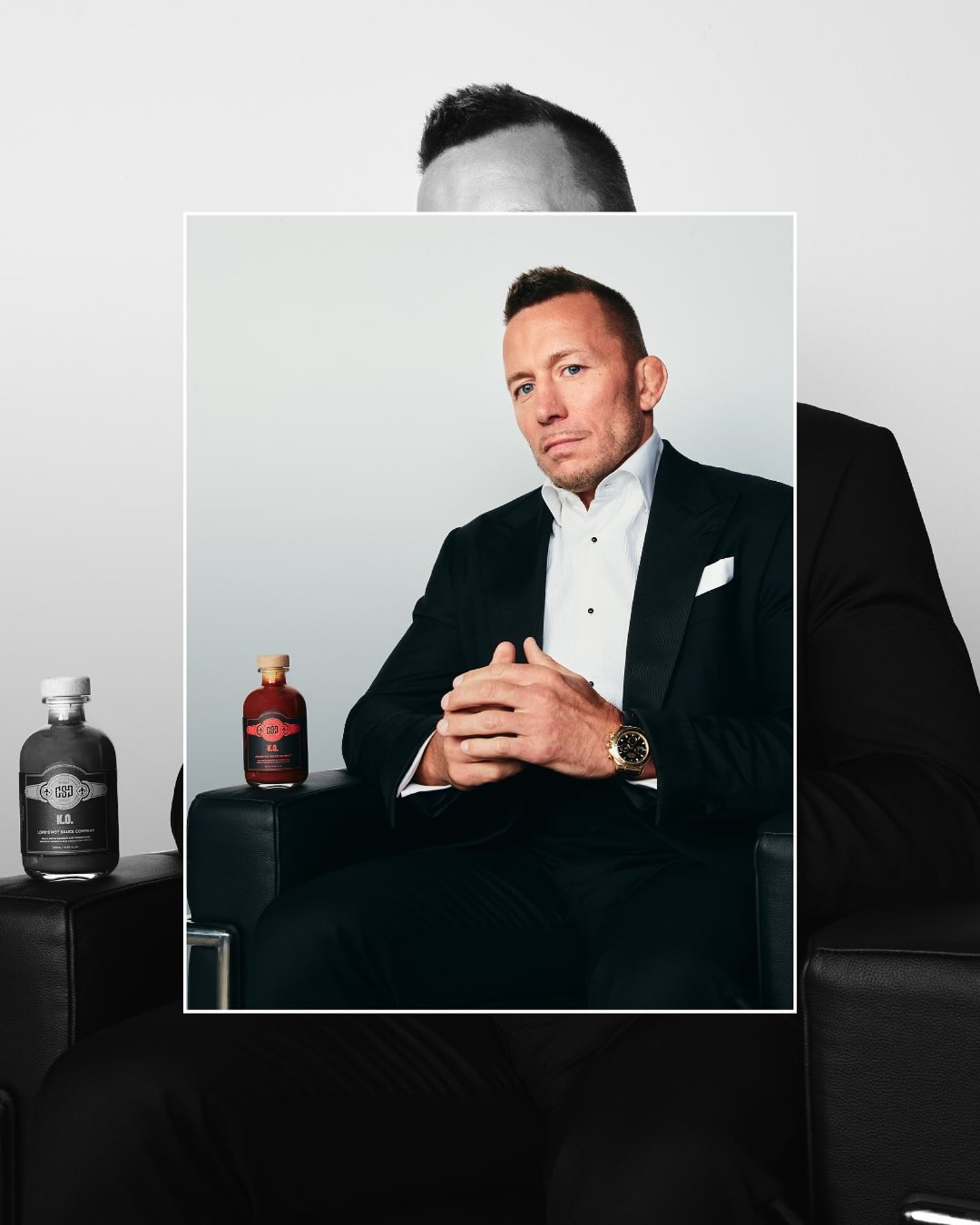 Georges St-Pierre next to a bottle of Lord's hot sauce