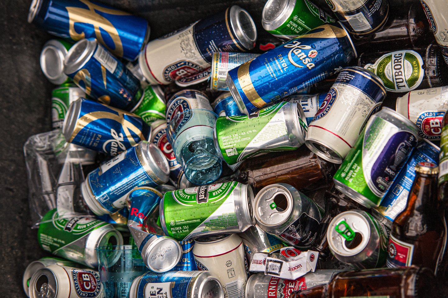 Empty beer cans in a bucket
