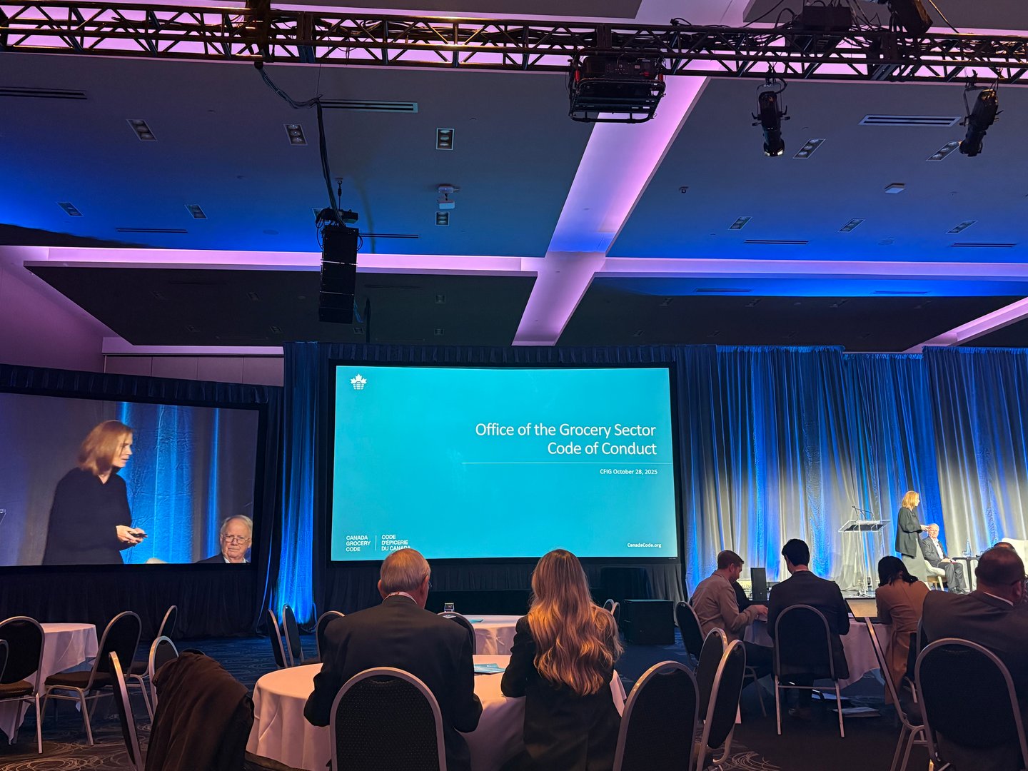 Karen Proud presenting on stage at GIC