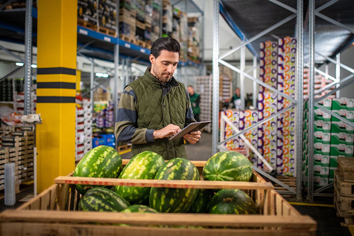 Man writing on clipboard