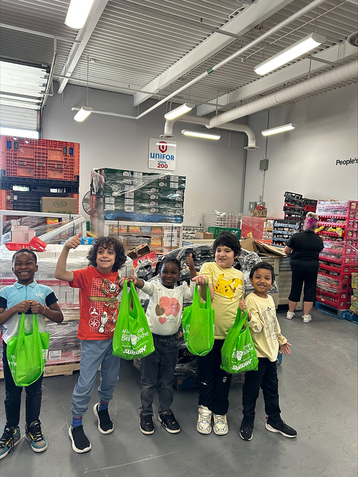 Kids holding shopping bags
