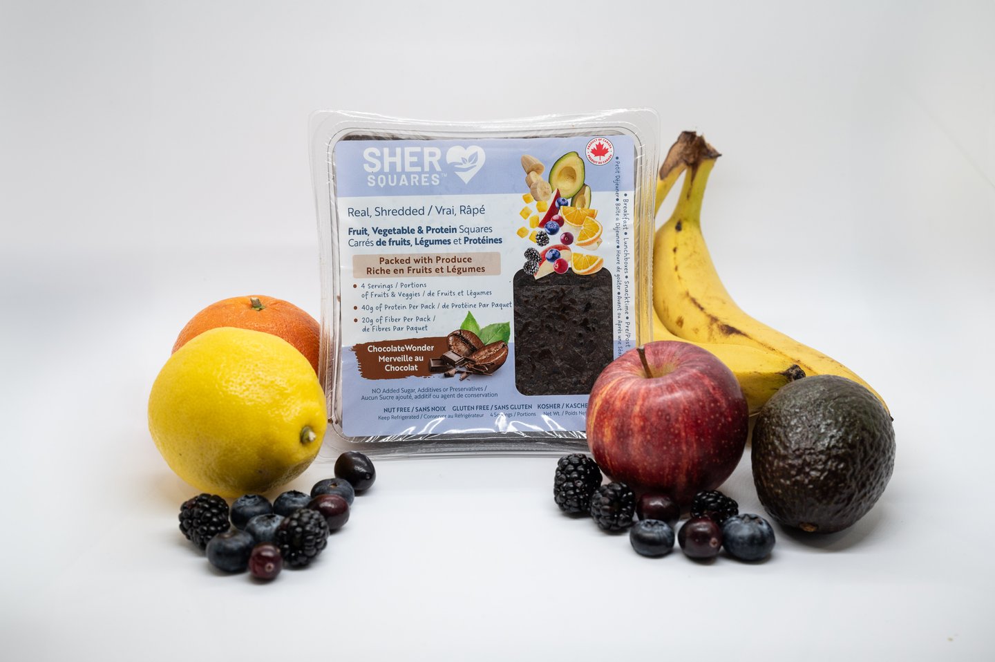 A pack of Sher Squares surrounded by fruit
