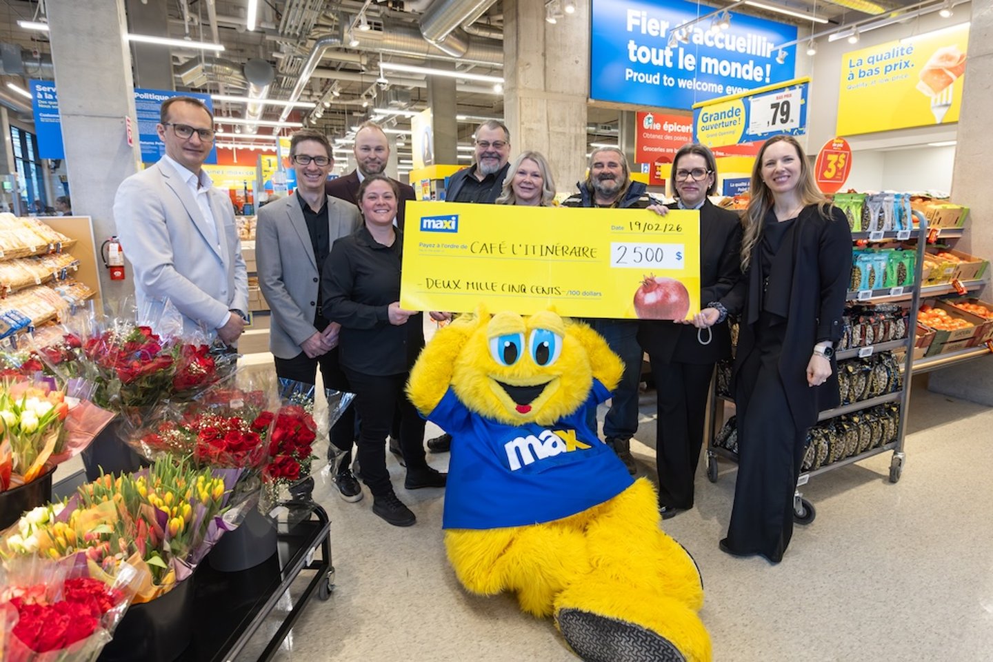 Maxi Sainte-Catherine Street store opening cheque presentation