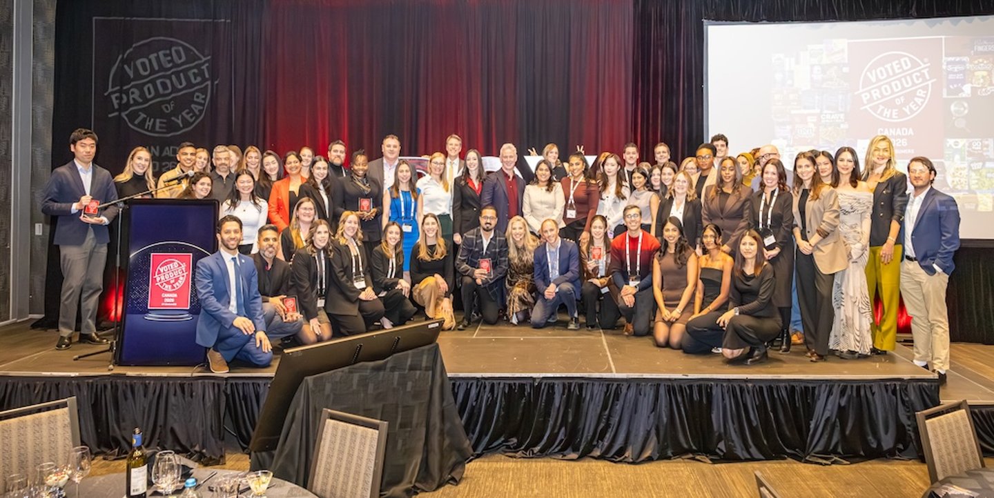 Winners pose with their award