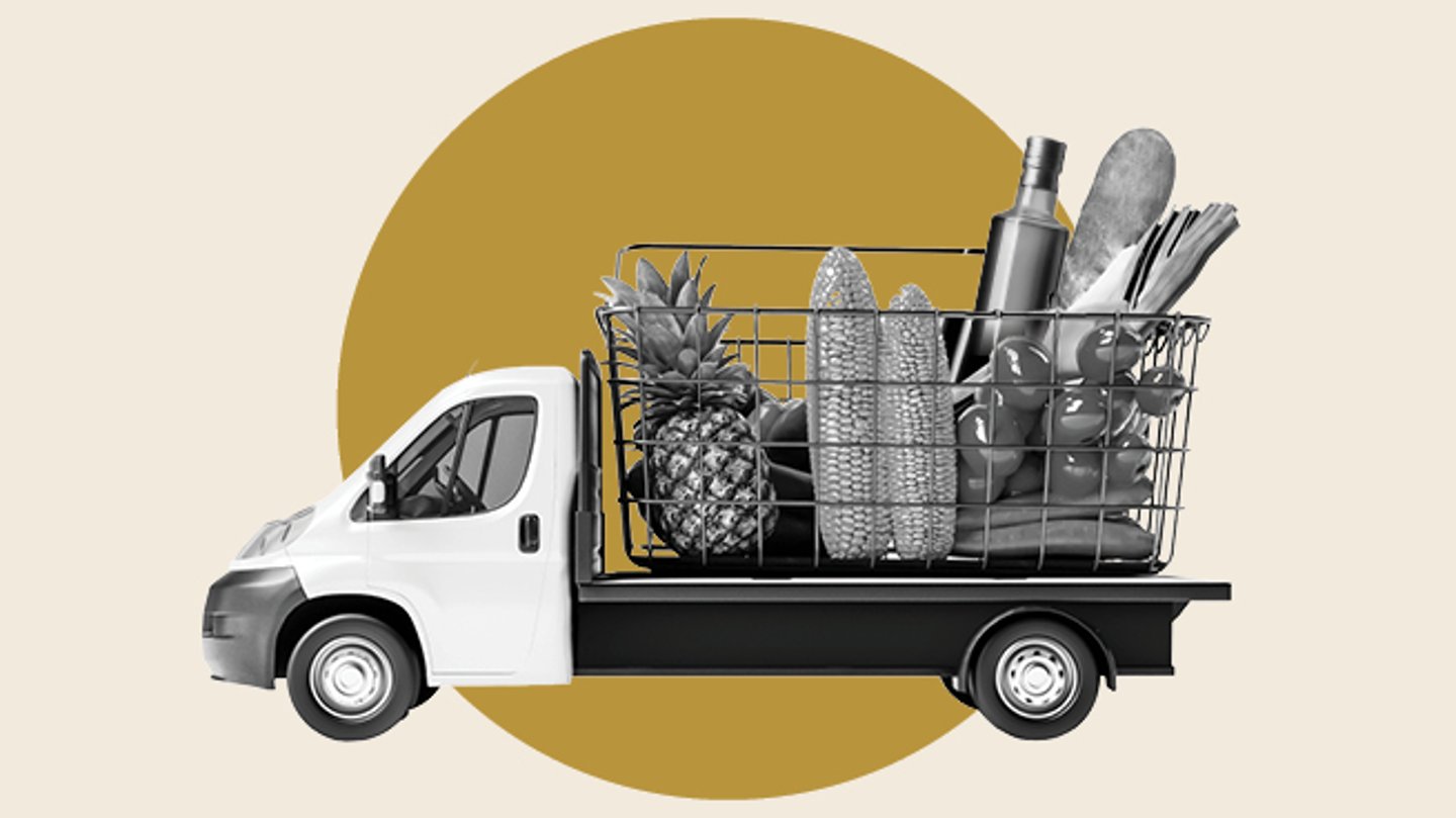 a delivery truck with groceries in the back