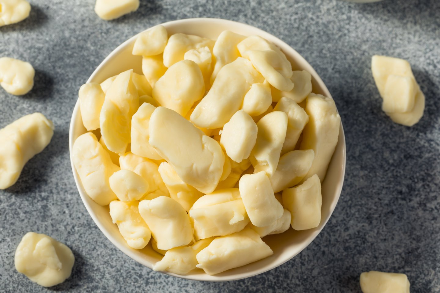 Raw White Organic Cheese Curds in a Bowl