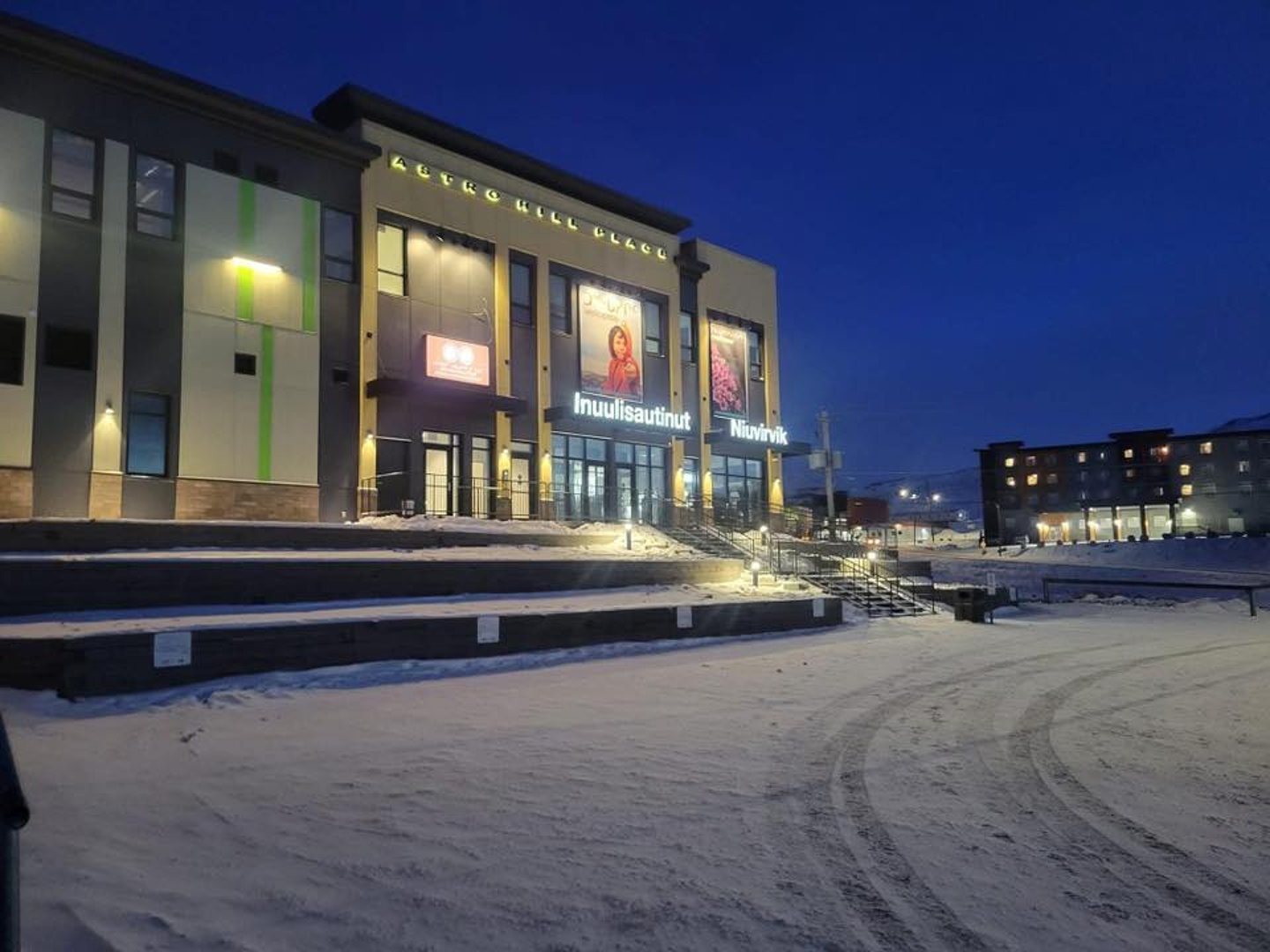 Exterior shot of Inuulisautinut Niuvirvik grocery store at night