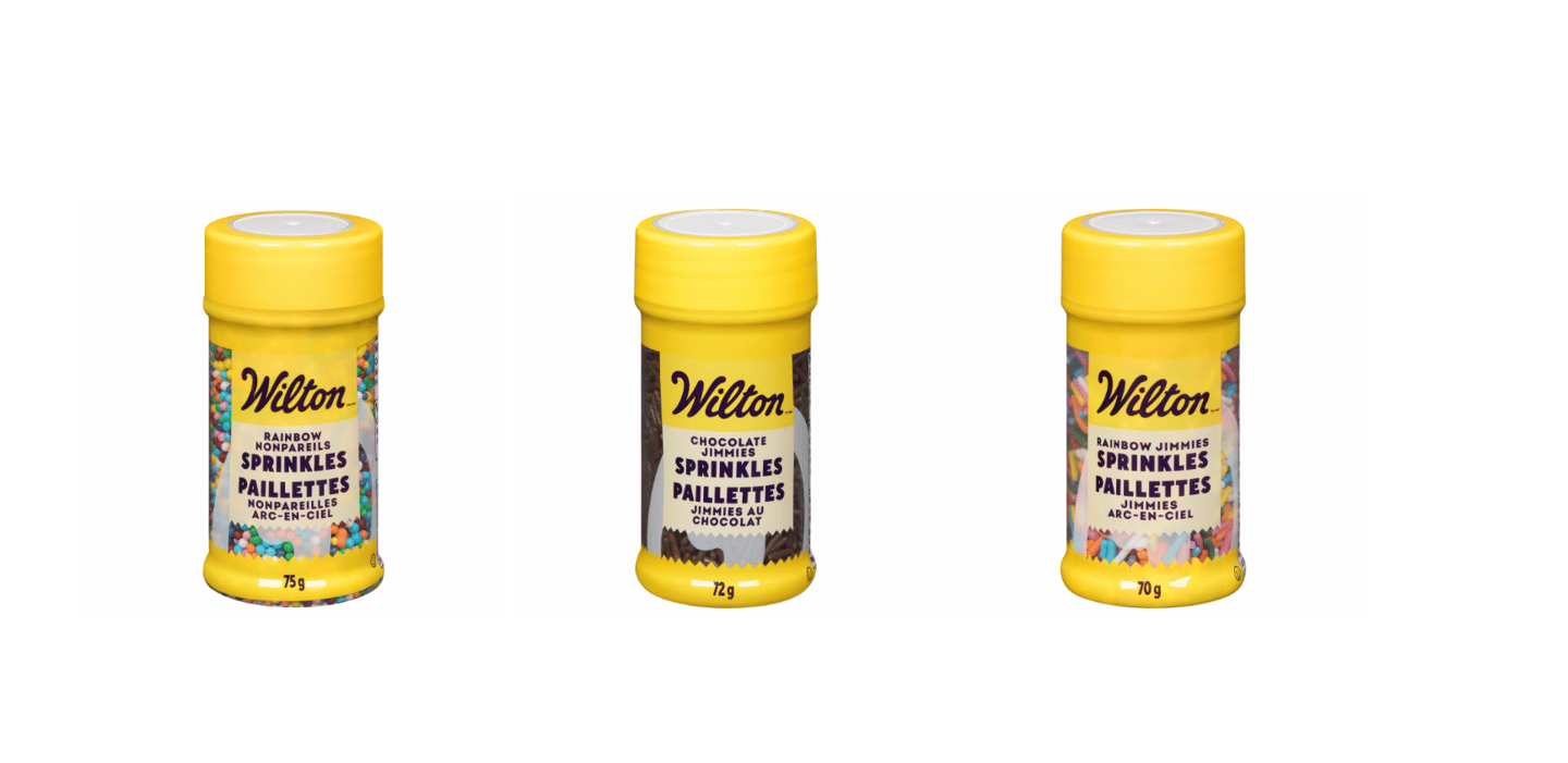 Three shakers of Wilton Sprinkles