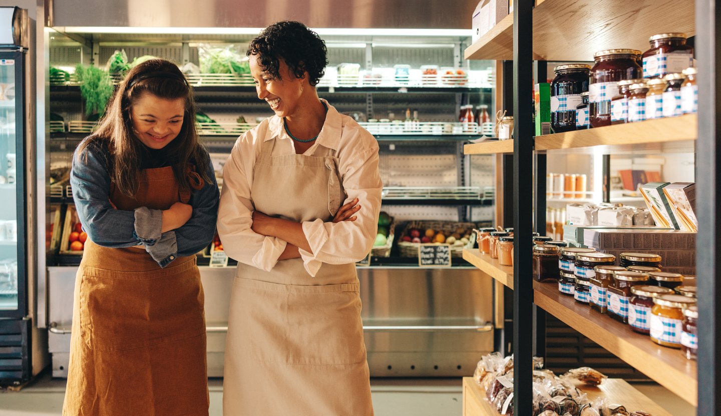 grocery store workers happy laughing