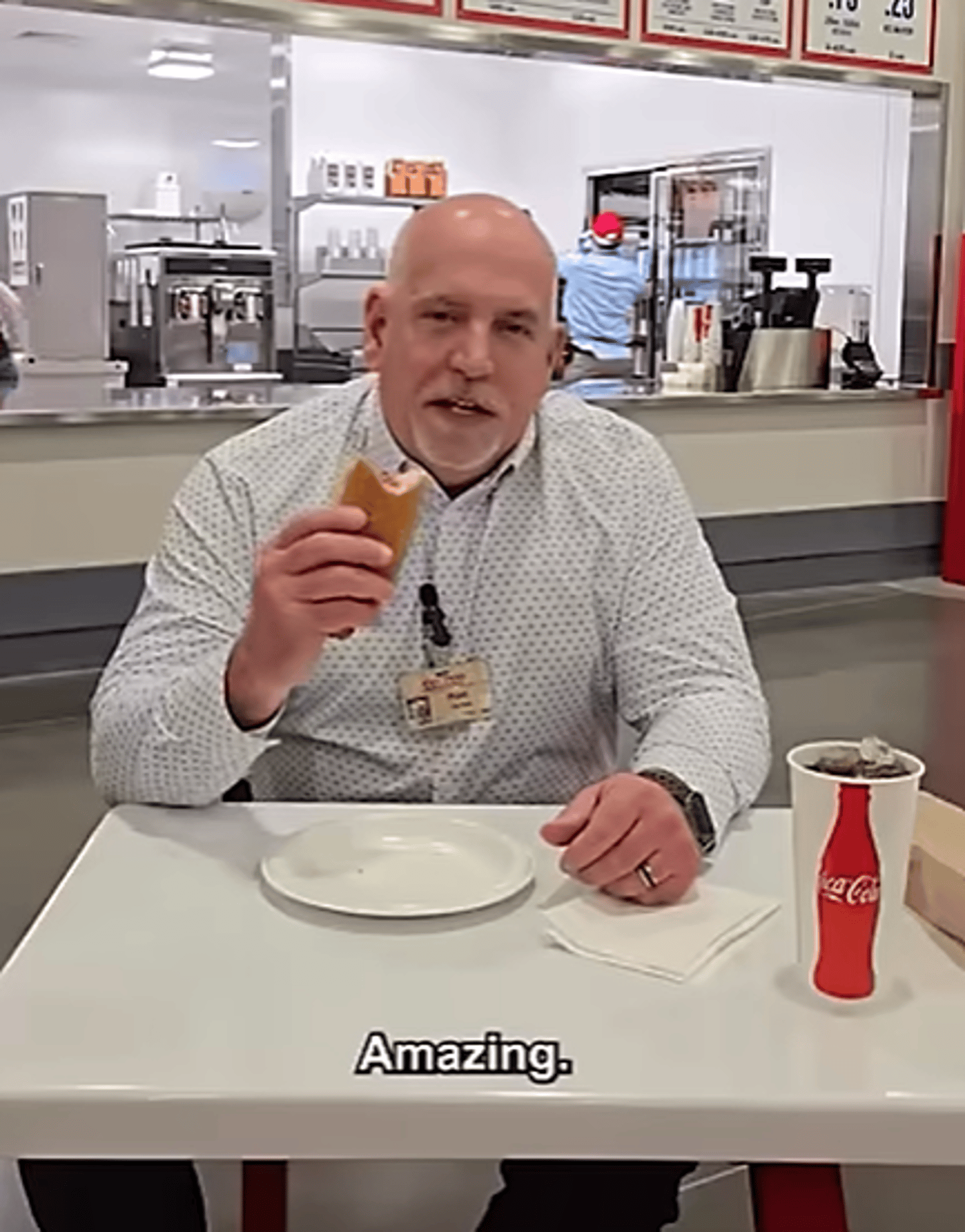 Costco CEO tastes hot dog