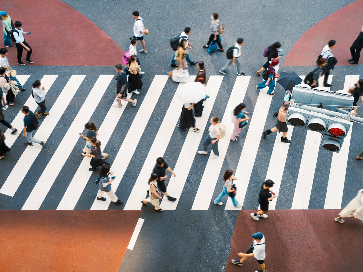 people crossing a busy street