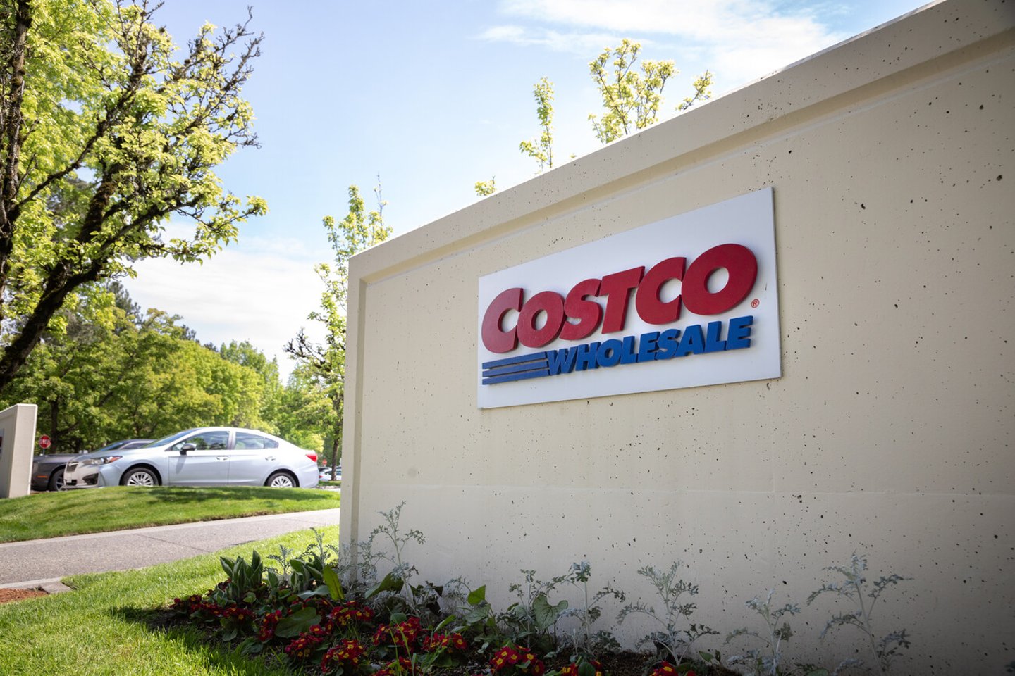 Issaquah, Washington / USA - May 4 2020:  Costco sign at the company headquarters building, with space for text on the left; Shutterstock ID 1724234737